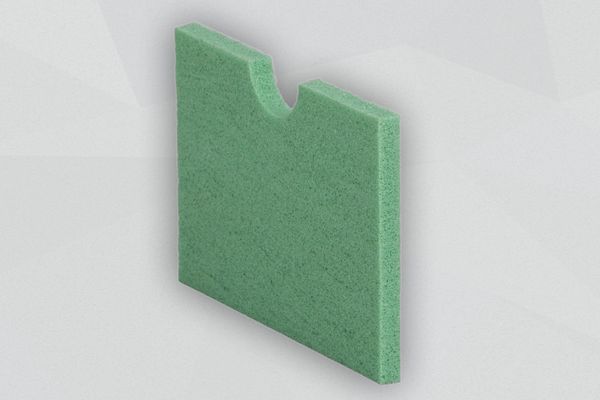 Gr&uuml;ne Platte Schwingungsisolierungen stehend