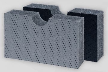 Dunkelgraue Schaumstoffplatte stehend mit gelochter Kunstlederoberfläche