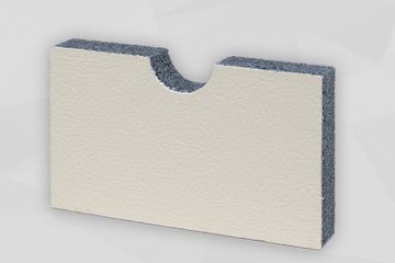 Dunkelgraue Schaumstoffplatte stehend mit beiger Kunstlederoberfläche